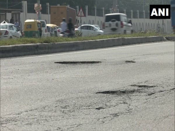 Visuals of potholes from NH-48 in Gurugram (Photo/ANI)