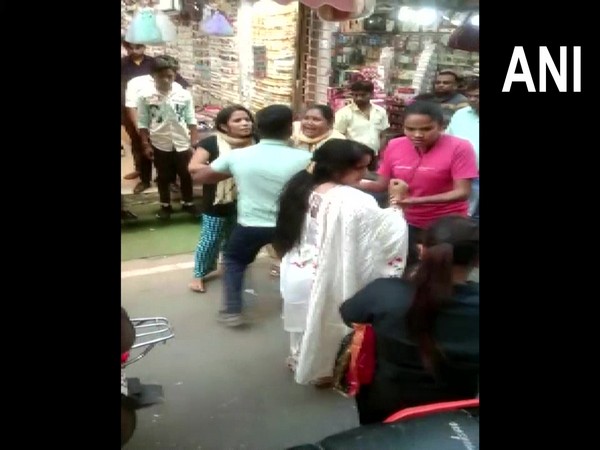 Visuals of women thrashing her husband (Photo/ANI)
