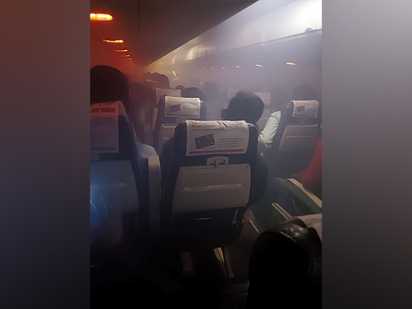 Smoke engulfs the cabin of a SpiceJet flight at Rajiv Gandhi International Airport, in Hyderabad on October 12. (Photo: ANI)