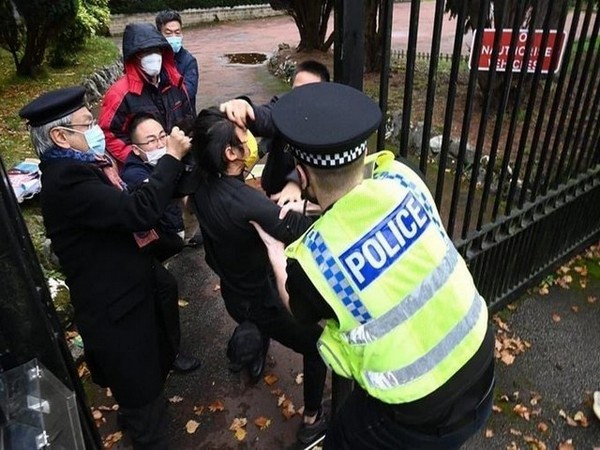 Chinese consult officials disrupted a peaceful protest outside their office in Manchester on Sunday. (Photo Credit: Alicia Kearns twitter)