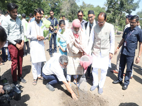 CM Chouhan planted saplings with  Padma Shri awardee Anil Prakash Joshi (Photo/ANI)