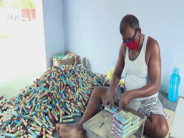 People involved in the production of firecrackers in Virudhunagar district's Sivakasi - the firecracker manufacturing hub in the country. (ANI Photo)