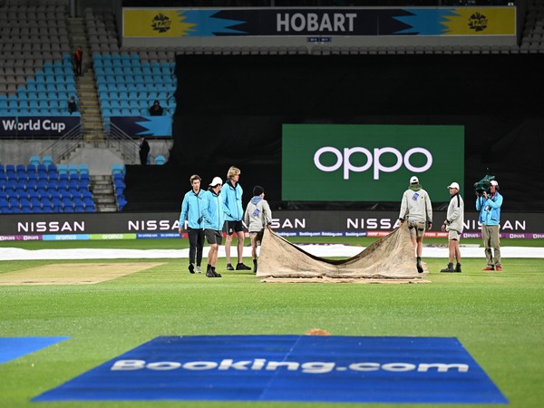 Pitch being covered by groundsmen (Photo: Twitter ICC)