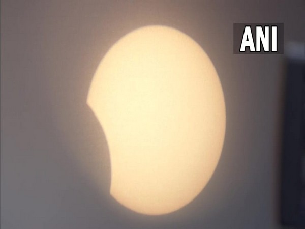 Visual of partial solar eclipse from Delhi (Photo/ANI)