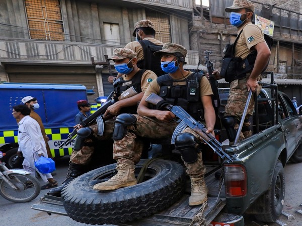 Pakistan Army soldiers patrol a street. (Image credit: Reuters)