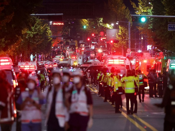 Rescue teams work at scene where dozens were injured in stampede in Seoul's Itaewon district. (Photo: Reuters)