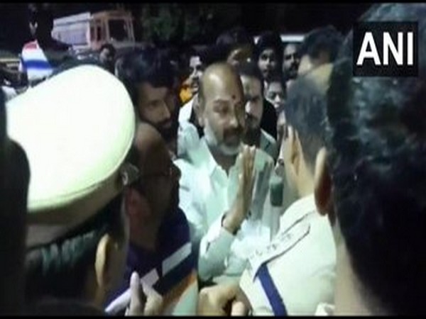 Telangana BJP president Bandi Sanjay stopped by the police on the Vijaywada Highway in Abdullapurmet on Wednesday night. (Photo/ANI)