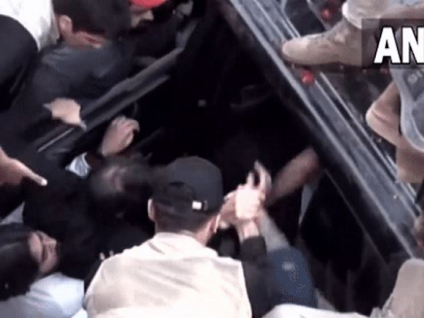 Imran Khan escorted from the crime scene (Photo Credit: PTI)