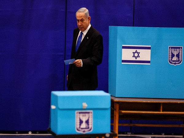 Benjamin Netanyahu casts his ballot on the day of Israel's general election at a polling station in Jerusalem November 1. (Photo Credit: Reuters)