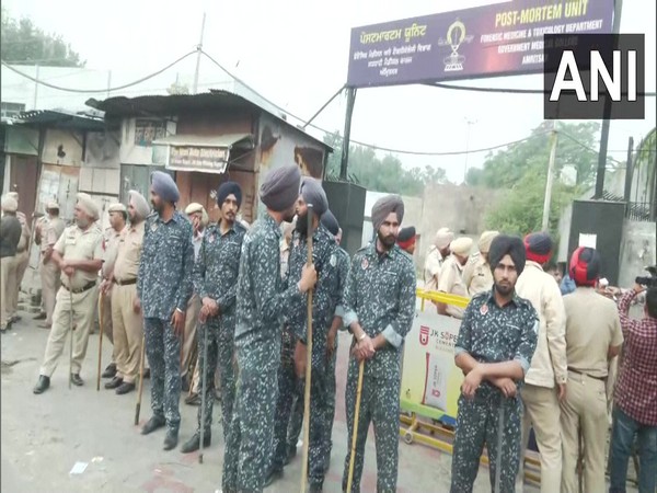 Security force deployed outside the post mortem unit in Punjab's Amritsar (Photo/ANI)