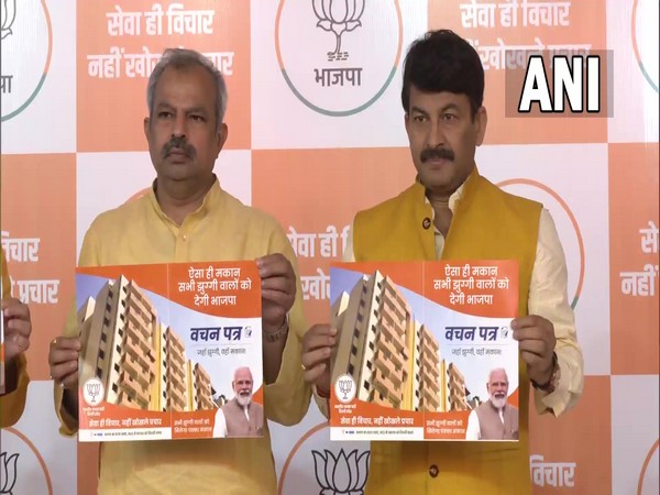BJP leaders Adesh Gupta and Manoj Tiwari (Photo/ANI)