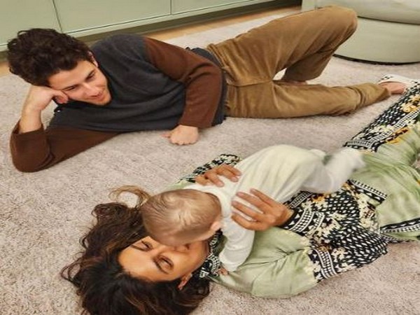 Priyanka Chopra with her daughter and husband (Image source: Instagram)