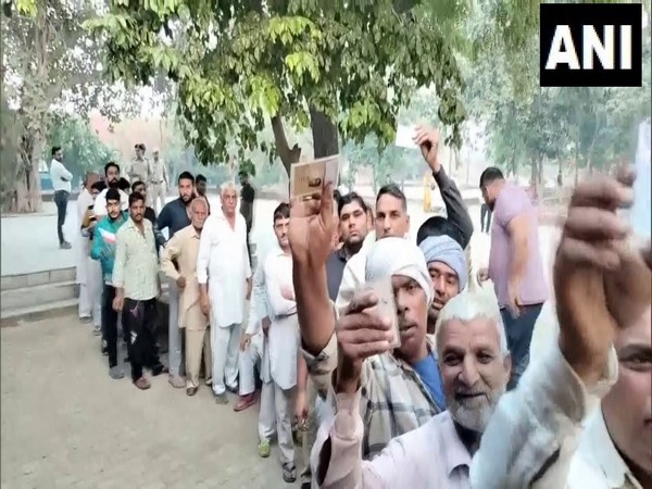 Visual outside the polling booth in Haryana's Rohtak (Photo/ANI)