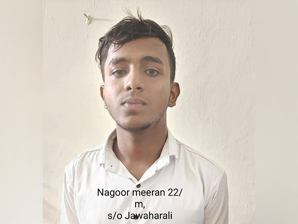 Arrested youth Nagoor Meeran with Tamil Nadu Police. (ANI/photo)