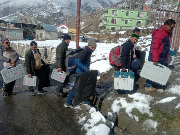 Voters wait in a queue to cast their votes for Himachal Pradesh Assembly elections, at a polling booth, Tashigang, in Kinnaur on Saturday (Photo/ANI)