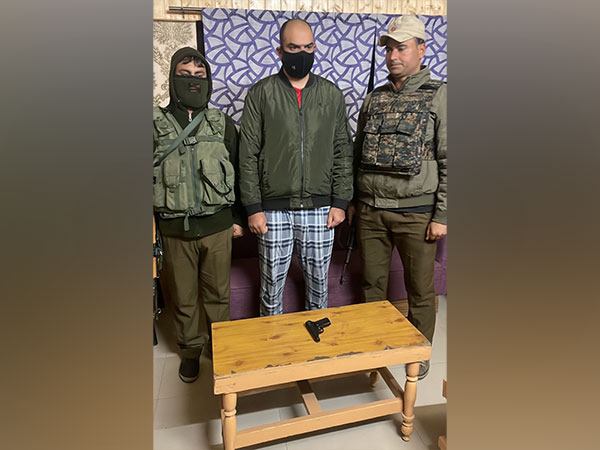 The accused after being arrested by Srinagar Police. (ANI/Photo)
