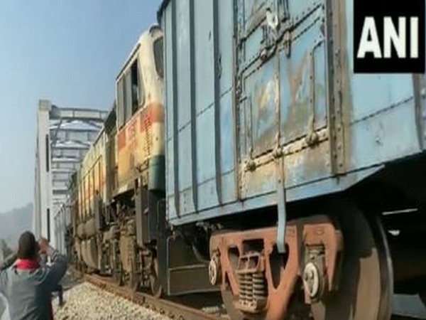 A goods train passes through track (Photo/ANI)