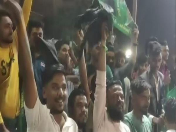 People with black flags during Owaisi rally (Photo from visuals/ANI)