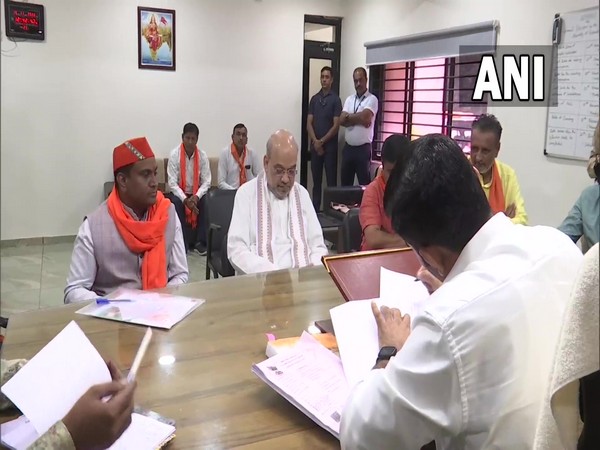 BJP's Sanand constituency candidate Kanu Patel (left) with Home Minister Amit Shah filing nomination for upcoming Gujarat polls (Photo/ANI)