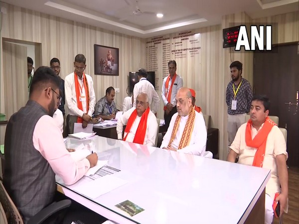Gujarat CM Bhupendra Patel (left) filing his nomination for Ghatlodya constituency in the state with Home Minister Amit Shah (right) [Photo/ANI)