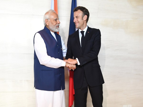 Prime Minister Narendra Modi with French President Emmanuel Macron at G20 Summit in Bali. (Photo Credit - Twitter/PM Modi)