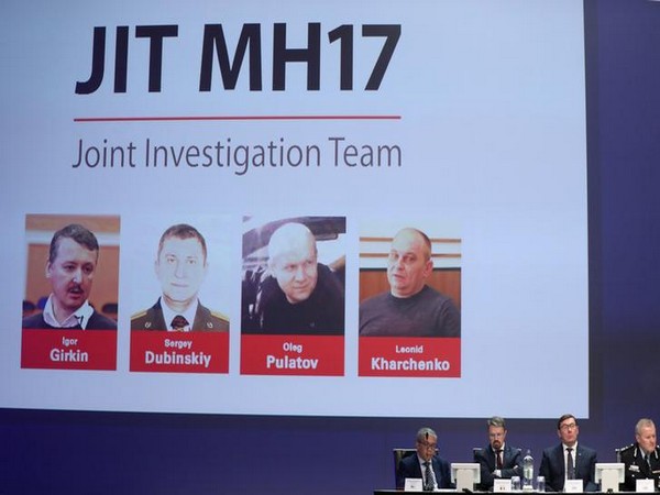 Russian nationals suspected of the downing of flight MH17, are shown on screen as international investigators present their latest findings on Wednesday