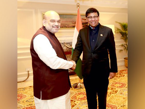 Union Home Minister Amit Sahh and FATF President T Raja Kumar. (Photo: Twitter//@HMOIndia)