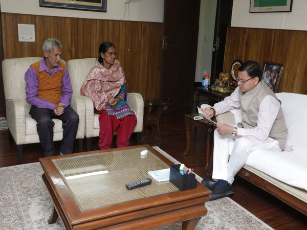 CM Pushkar Singh Dhami meeting the victim's parents. (Photo/ANI)