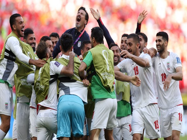 Iran team celebrate after Roozbeh Cheshmi scored against Wales in Group B match of FIFA World Cup 2022 (Image: FIFA World Cup Twitter)