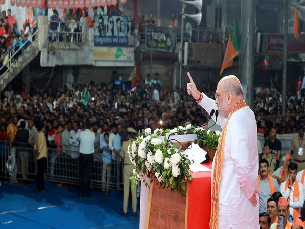 Union Home Minister Amit Shah addresses a public meeting for the upcoming Gujarat Assembly elections, at Naroda, in Ahmedabad on Friday. (Photo/ANI)
