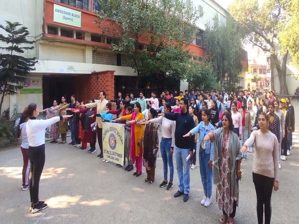 Students at Government SPMR college of Commerce taking oath on the Constitution Day in Jammu (Photo/ANI)