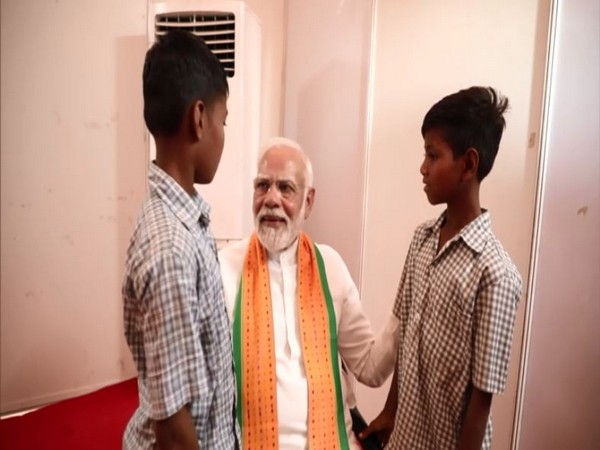 Prime Minister Narendra Modi with Avi and Jay in Netrang (Photo/ANI)