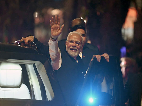 Prime Minister Narendra Modi during a roadshow in Surat (Photo:ANI)