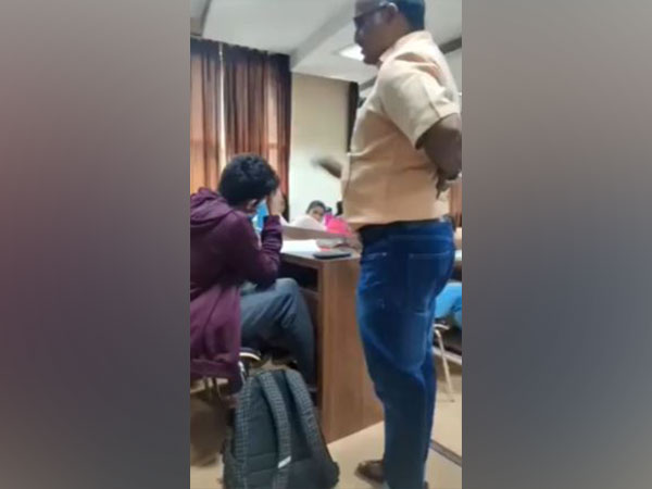 Screen grab from the viral video of the student confronting the teacher (Photo/ANI)