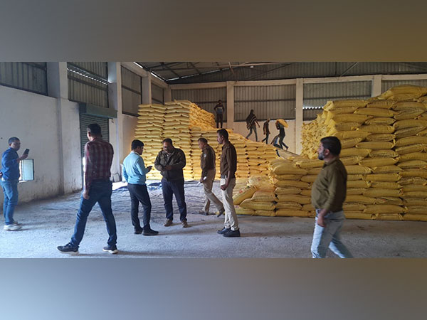 The police inspecting the warehouse (Photo/ANI)