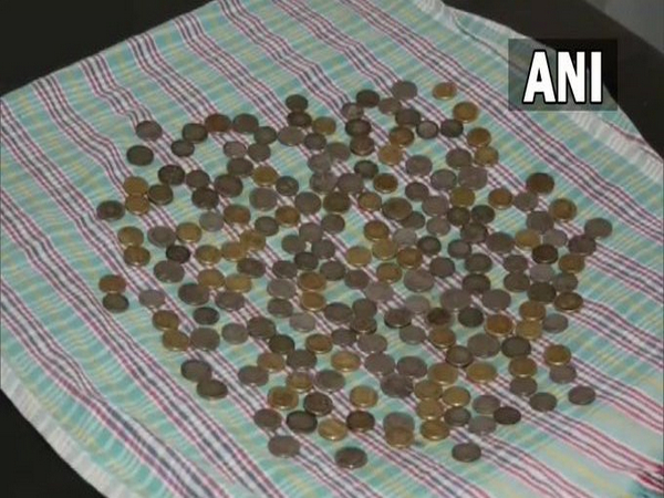The coins recovered by doctors from the patient's stomach.