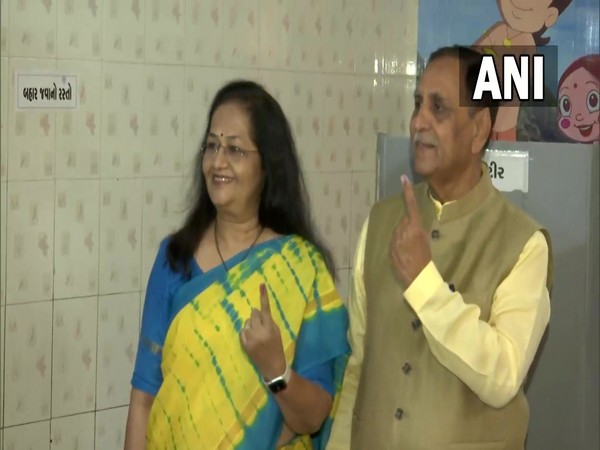 Former Gujarat CM Vijay Rupani and his wife Anjali Rupani cast their votes (Photo/ANI)