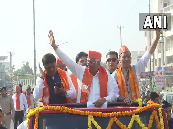 Gujarat CM Bhupendra Patel in his roadshow in Mehsana (Photo/ANI)