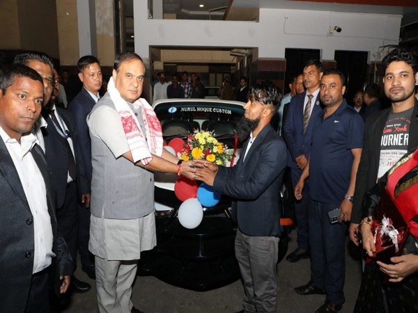 Chief Minister Himanta Biswa Sarma receiving the modified car (Photo/ANI)