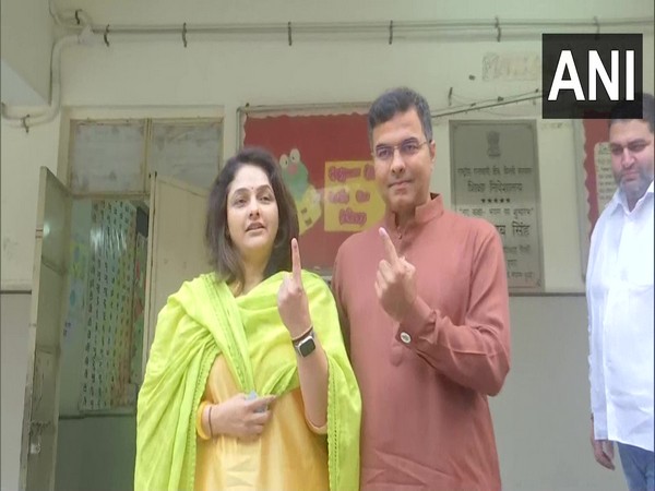 BJP MP Parvesh Verma with his wife (Photo/ANI)