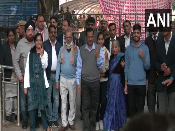 Delhi CM Arvind Kejriwal along with his family cast their votes at a polling booth in Civil Lines (Photo/ANI)