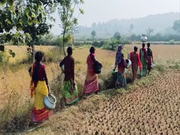 Idaldih villagers on their way to collect water (Photo/ANI) 