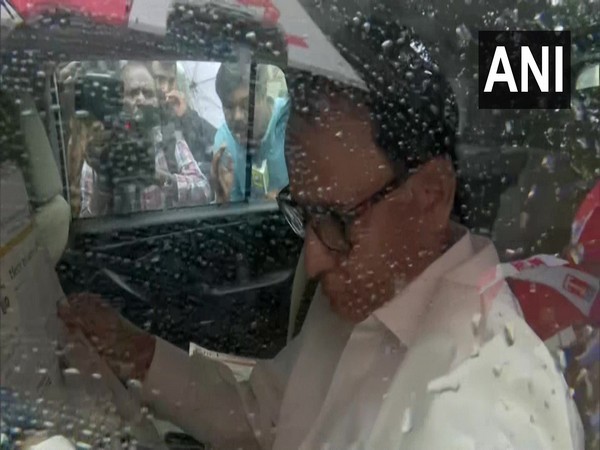 CBI officers leaving K Kavitha's residence. (Photo/ANI)