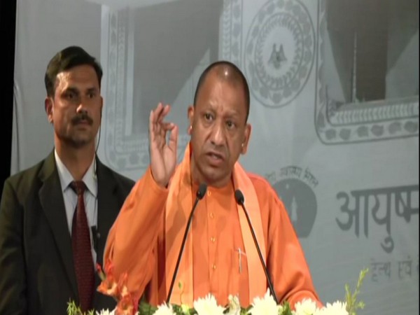 Yogi Adityanath at Universal Health Cover day celebrations in Varanasi (Photo/ANI)