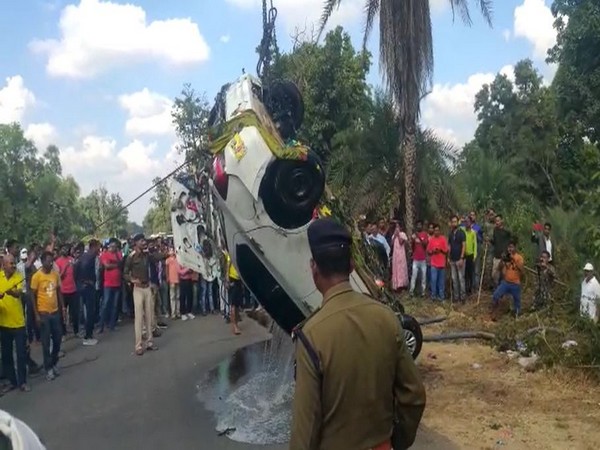 The car is being pulled out with the help of crane (Photo/ANI)