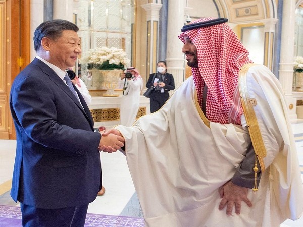 Saudi Crown Prince Mohammed Bin Salman shakes hands with Chinese President Xi Jinping during the China-Arab summit in Riyadh, Saudi Arabia December 9. (Photo Credit: Reuters)