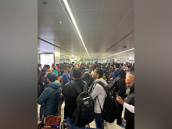 Passengers waiting in queues to board flight at Delhi IGI Airport (Photo/ANI)