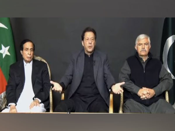 Former Pakistan Prime Minister Imran Khan (Center) (Photo Credit: PTI Youtube)