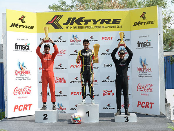 Kyle Kumaran (Centre) of podium after winning Novice Cup Race 1 (Image: FMSCI)
