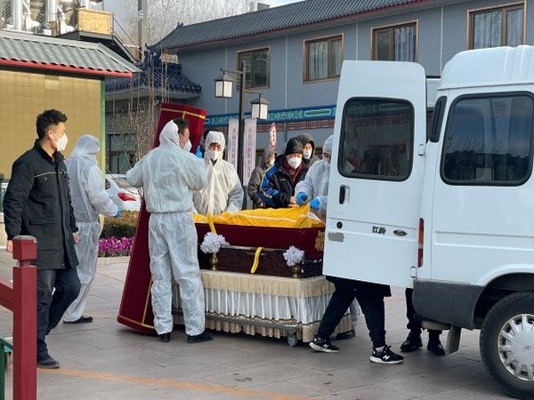 Workers at a funeral home in Beijing. (Photo Credit - Reuters)